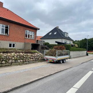 Trailertømning hos Den Rigtige Gartner. Kom nemt af med bygge eller haveaffald